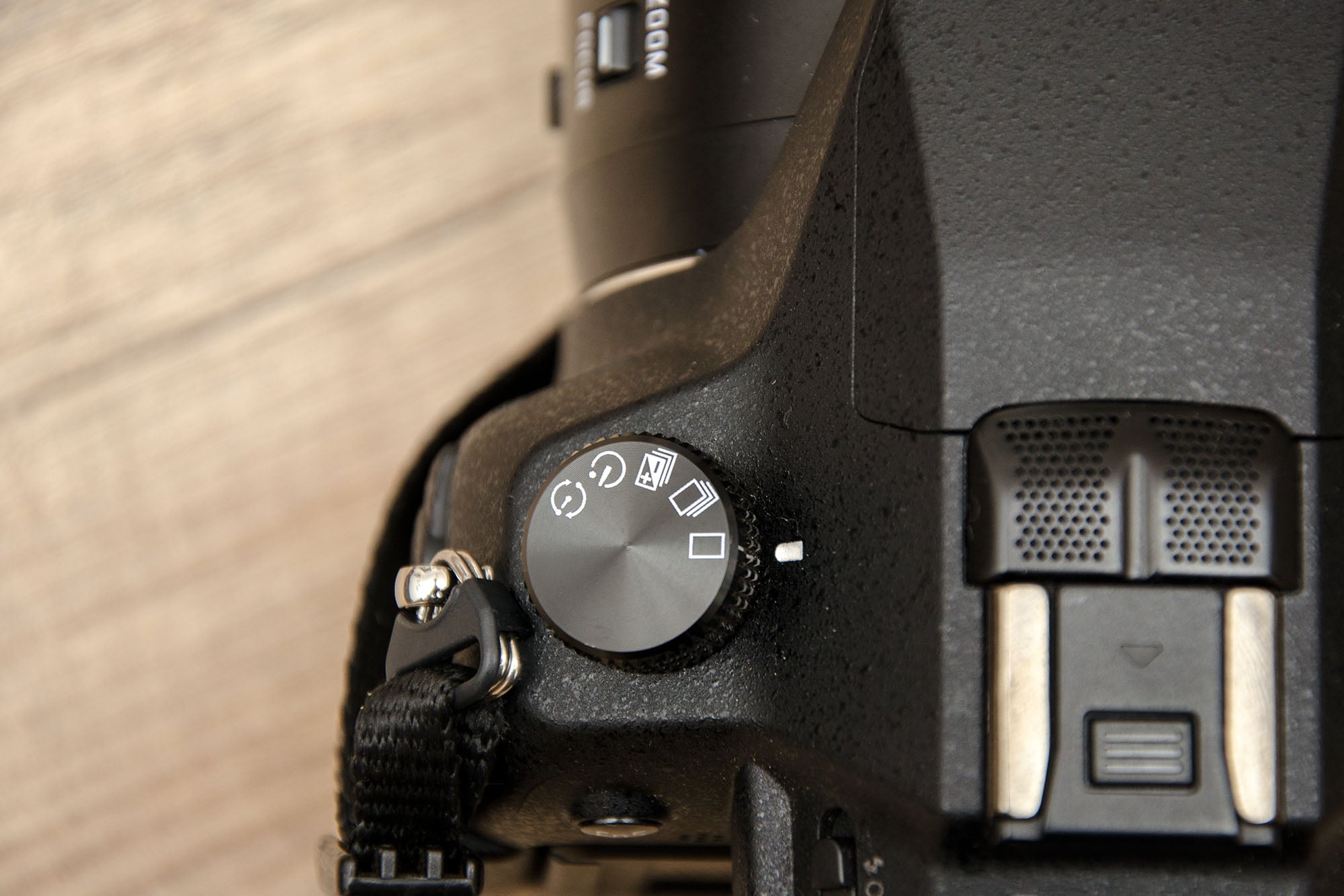 Nahaufnahme Rad für Serienaufnahme und Timer bei Lumix Kamera
