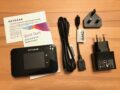 Lieferumfang: AirCard 810, Akku, Netzteil, Bedienungsanleitung, Kabel